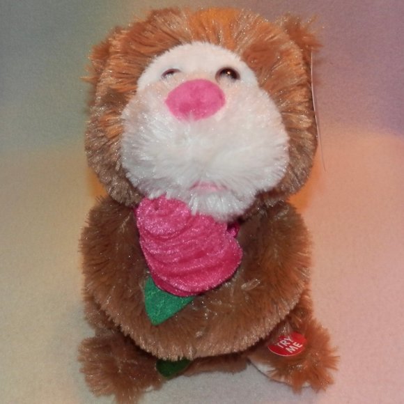 ANIMATED SINGING BEAR * HOLDING A PINK ROSE * 9 IN * SINGS BABY * CUTE * NEW - Picture 1 of 3